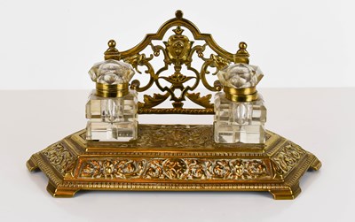 Lot 52 - An early 20th century brass desk stand, with...