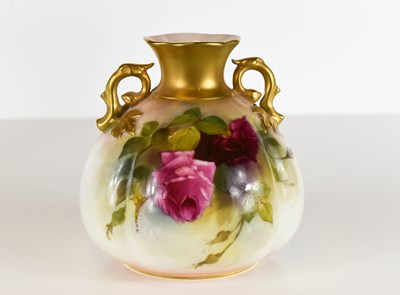 Lot 199 - A Royal Worcester twin handled globular vase,...