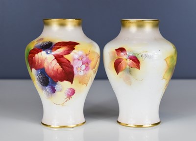 Lot 148 - A pair of Royal Worcester vases by Kitty Blake,...