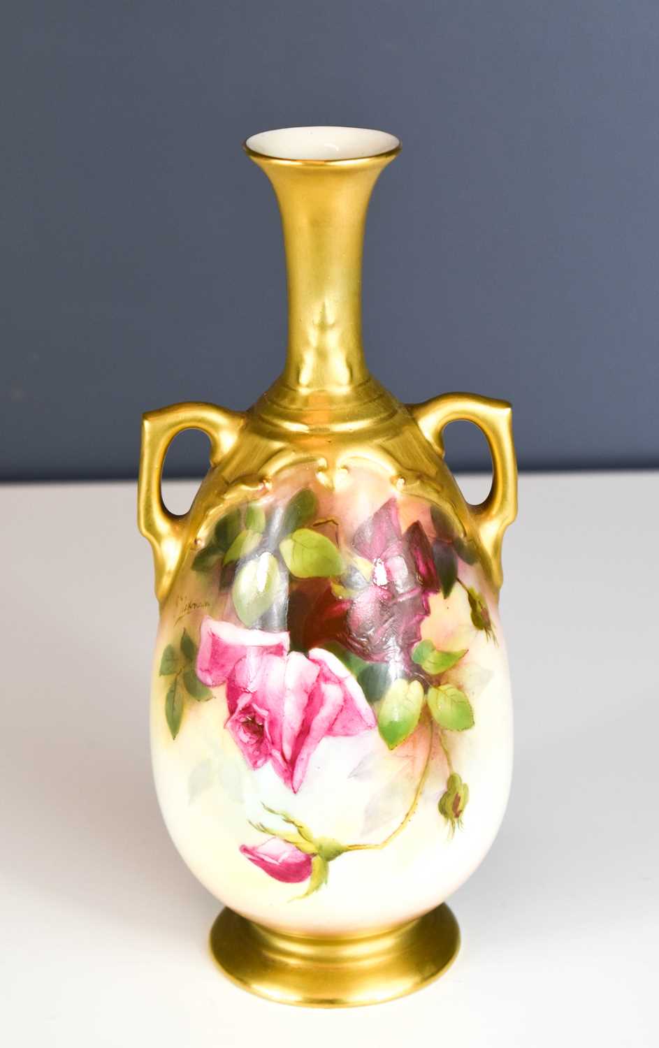 Lot 193 - A Royal Worcester twin handled vase by Flaxman,...