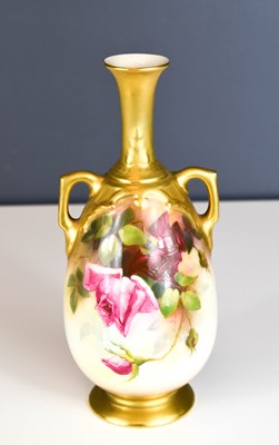 Lot 193 - A Royal Worcester twin handled vase by Flaxman,...