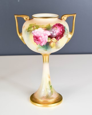 Lot 197 - A Royal Worcester pedestal vase, with twin...