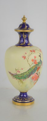 Lot 187 - A Royal Worcester vase and cover painted with...