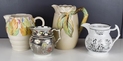 Lot 142 - A group of four water jugs, one Sunderland...