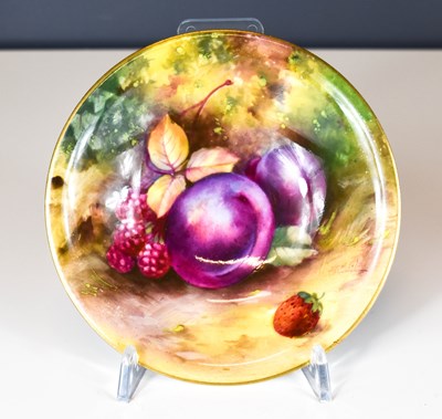 Lot 164 - A Royal Worcester dish, painted with plums in...