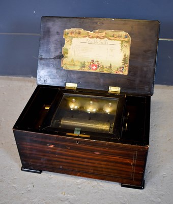 Lot 62 - A 19th century Swiss music box, the rosewood...