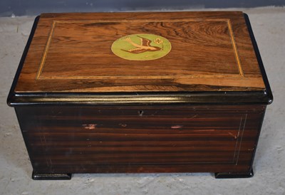 Lot 62 - A 19th century Swiss music box, the rosewood...