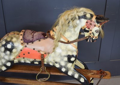 Lot 357 - An Edwardian dapple grey rocking horse, circa...