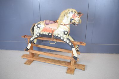 Lot 357 - An Edwardian dapple grey rocking horse, circa...