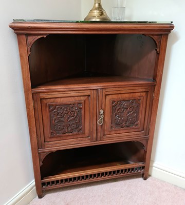 Lot 471 - An Edwardian standing corner cupboard in...