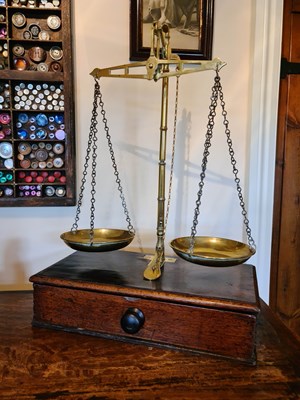 Lot 297 - A 19th century set of shopkeepers brass scales,...