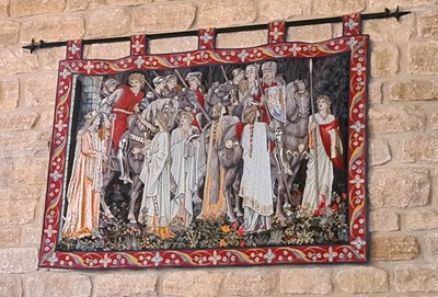 Lot 374 - A large medieval style tapestry wall hanging,...