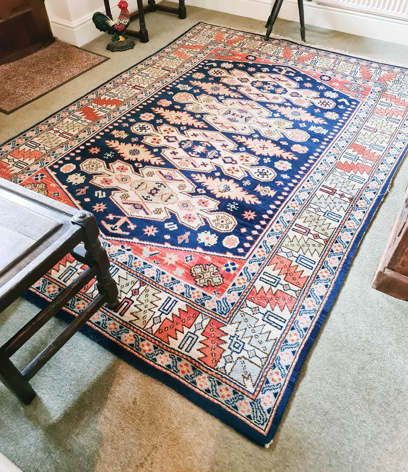 Lot 510 - An antique Middle Eastern wool rug, with...