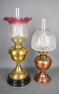 Lot 68 - Two antique paraffin lamps, one in brass, the...