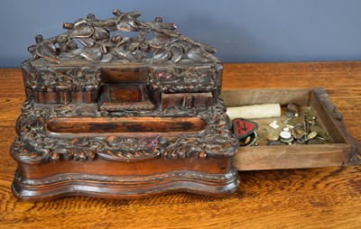 Lot 58 - A 19th century Blackforest inkwell, carved...