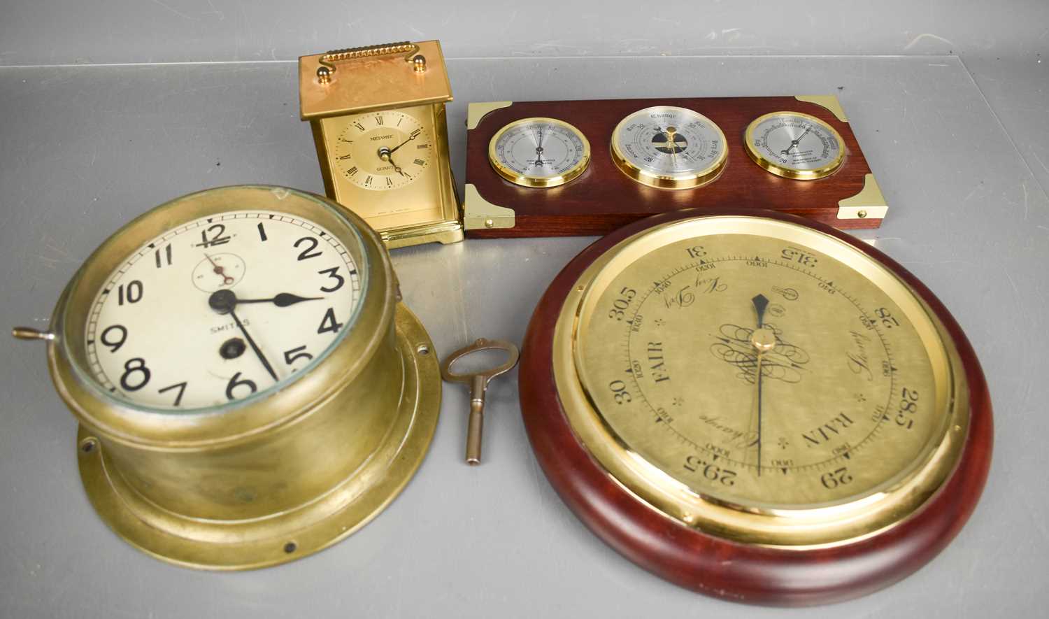 Lot 292 - A 20th century ships clock and barometer, wall...