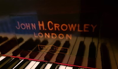 Lot 91 - A John H Crowley of London baby grand piano,...