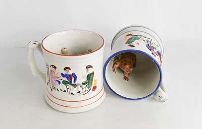 Lot 97 - Two 19th century frog mugs, the exteriors...