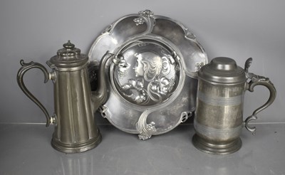 Lot 326 - An Art Nouveau pewter charger, embossed with a...