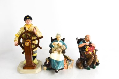 Lot 128 - Three Royal Doulton figurines, comprising The...