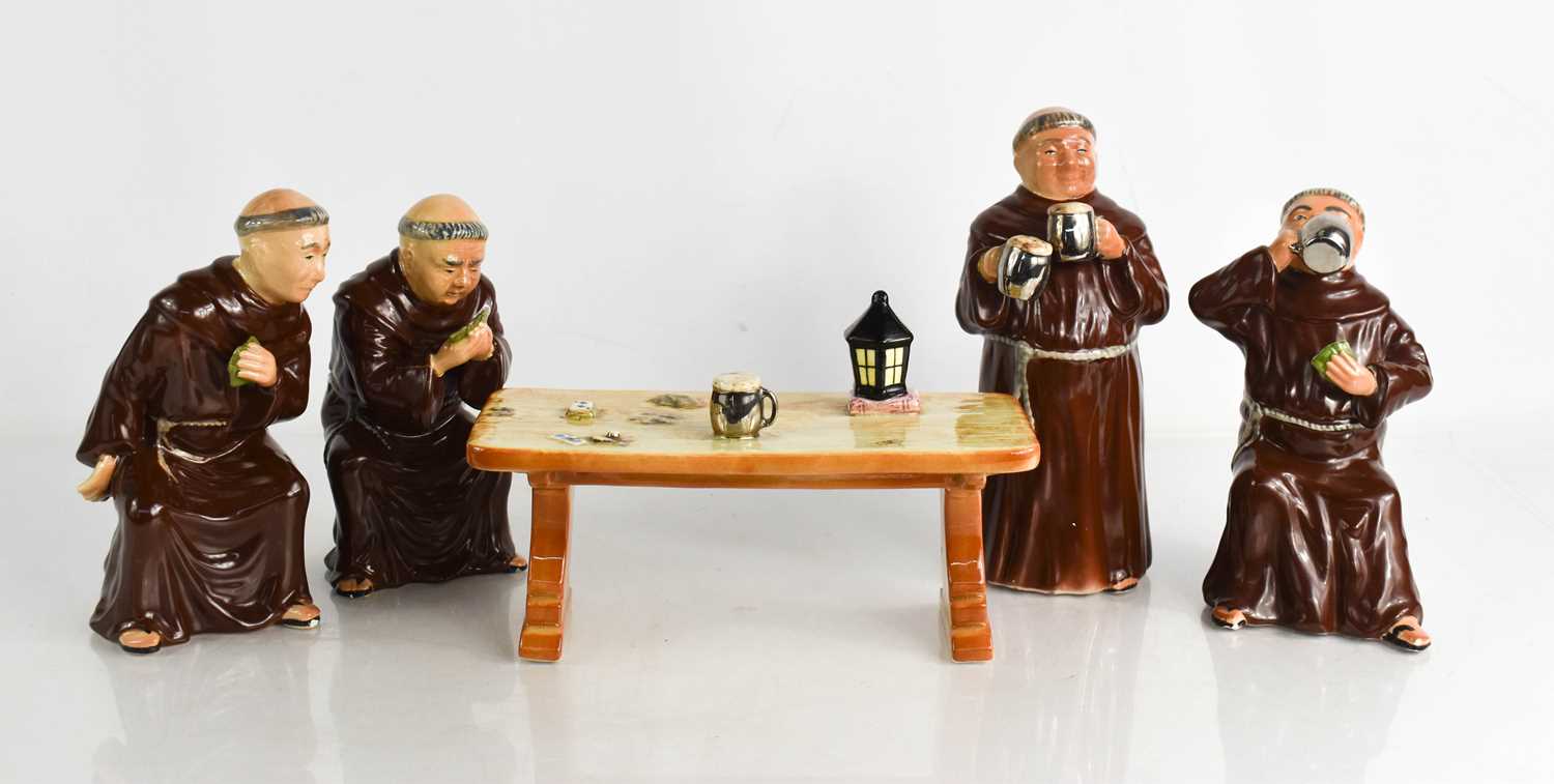 Lot 138 - A set of Bretby pottery 'Jovial Monks',...