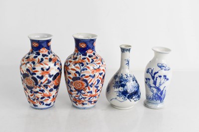 Lot 269 - A pair of Chinese Imari style bud vases,...