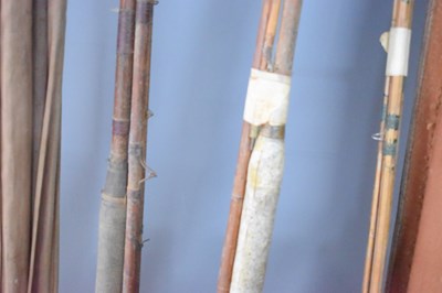 Lot 77 - A group of antique split cane fishing rods,...
