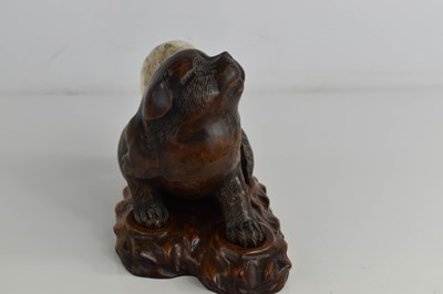 Lot 11 - A late 19th century Japanese carved boxwood...
