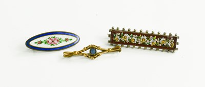 Lot 20 - A group of three vintage brooches, comprising...