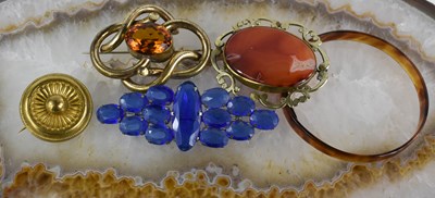 Lot 16 - A group of four vintage brooches, including an...