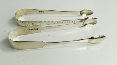 Lot 205 - A pair of George III silver sugar tongs,...