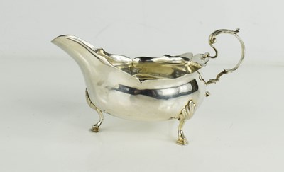 Lot 202 - A silver sauce boat by James Crawford,...