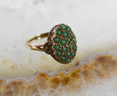 Lot 29 - A vintage 9ct gold ring, the large marquise...