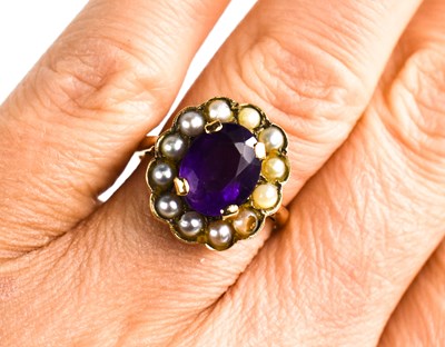 Lot 6 - A 9ct gold amethyst and seed pearl ring, with...