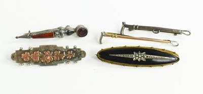 Lot 24 - A 9ct gold and silver stock pin in the form of...
