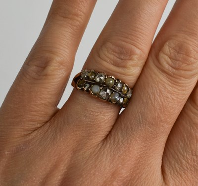 Lot 164 - A Georgian dress ring set with seven old mine...