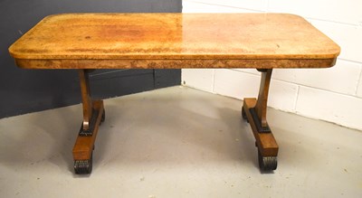 Lot 447 - A Regency burrwood rectangular library table,...