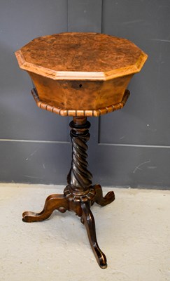 Lot 428 - A Victorian octagonal walnut teapoy, hinged...