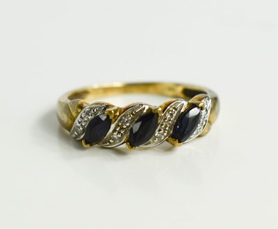 Lot 117 - A 9ct gold, diamond and sapphire ring, size M½,...