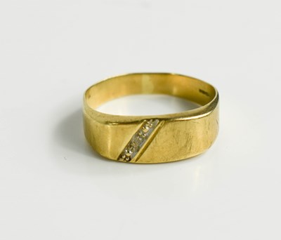 Lot 76 - A 9ct gold ring, with diagonally impressed...