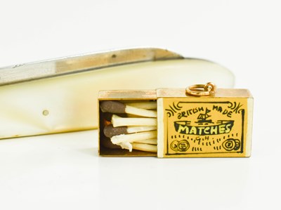 Lot 133 - A 9ct gold matchbox pendant, 'British Made...