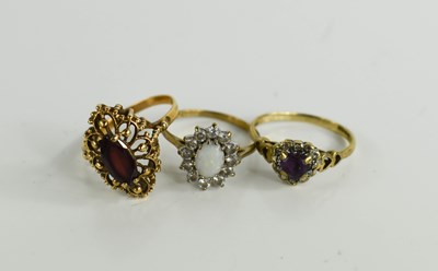 Lot 110 - Three 9ct gold rings, one set with opal, one...