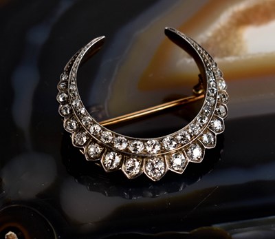 Lot 5 - A stunning French diamond and gold crescent...