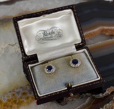Lot 2 - A pair of antique 9ct white gold, sapphire and...
