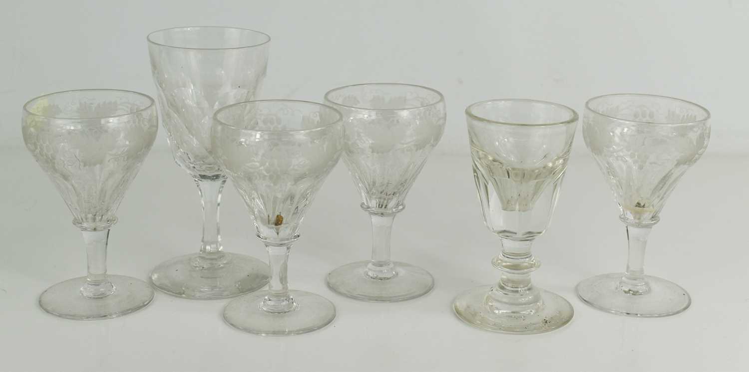 Lot 42 - A set of four Victorian glasses etched with...