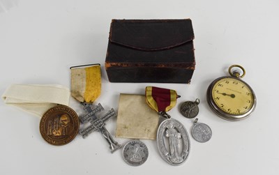 Lot 198 - A pocket watch together with a group of medals...