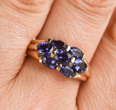 Lot 143 - A 9ct gold and tanzanite ring, size R½, 3.25g.