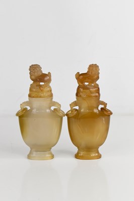 Lot 1 - A pair of late 19th Century Chinese carved...