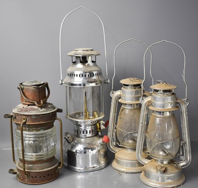 Lot 151 - A copper ships lantern together with three...