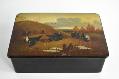 Lot 208 - An antique black lacquered box, the lid...